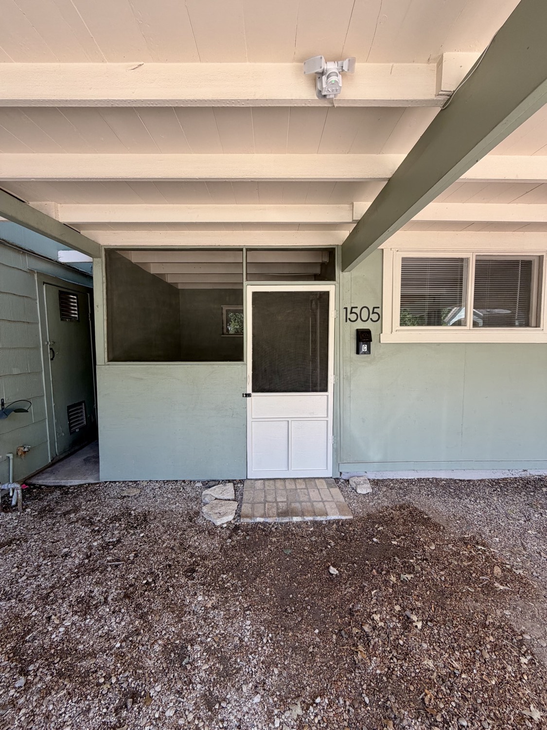 Covered front porch entry of unit 1505