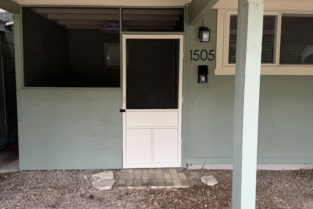Private covered entry of Unit C at 1505 W. 12th Street, showing the front door numbered 1505